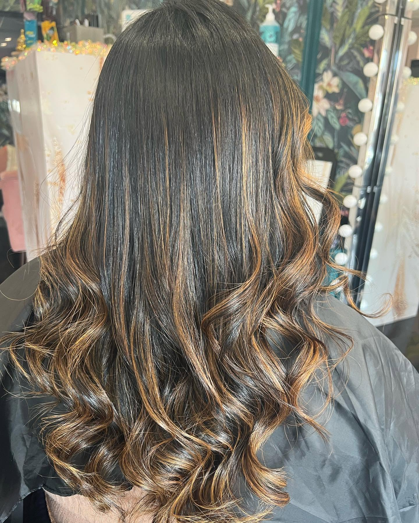 Glossy brunette colour with warm highlights