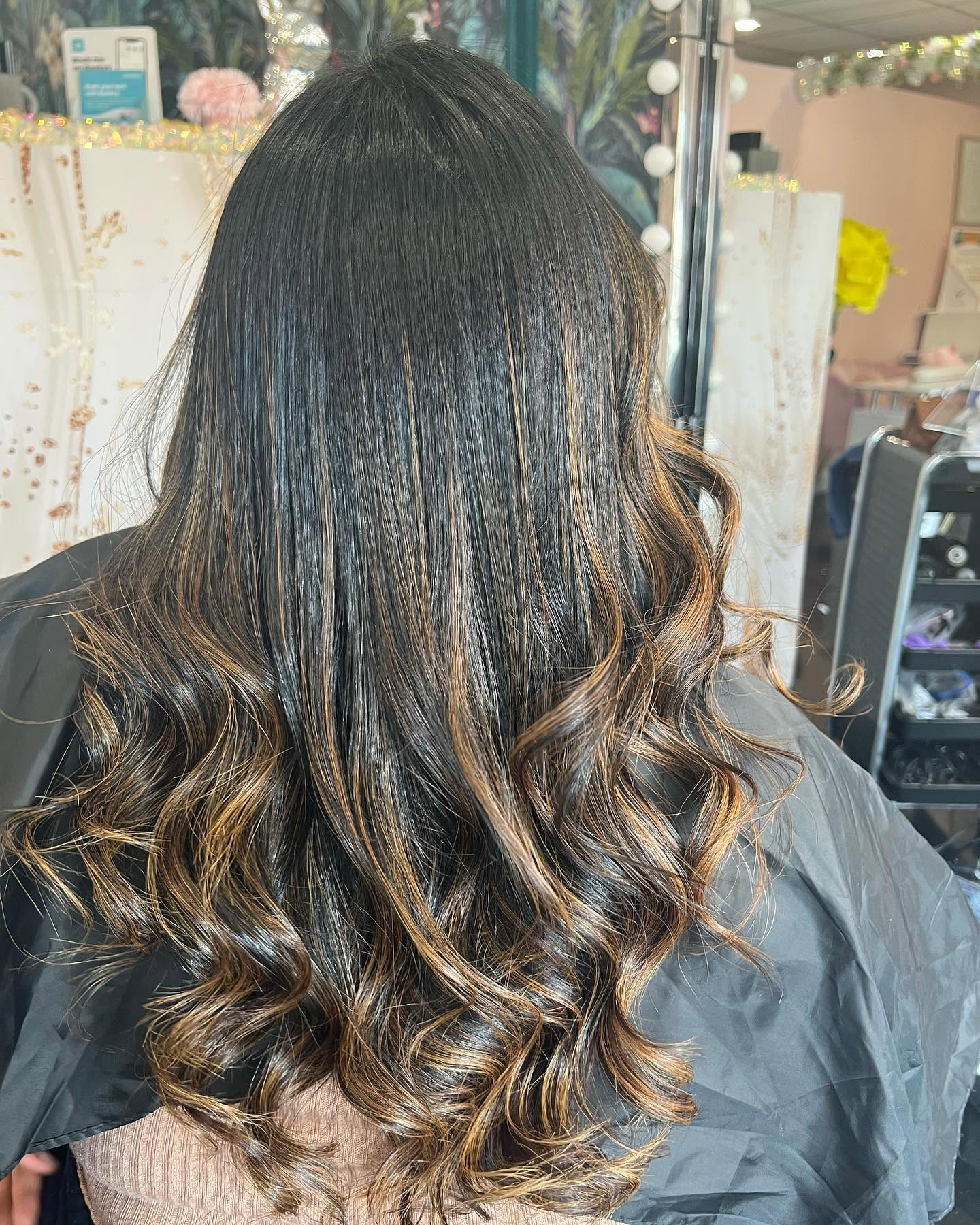 Warm highlighted brunette hair by Vanda Hairdresser